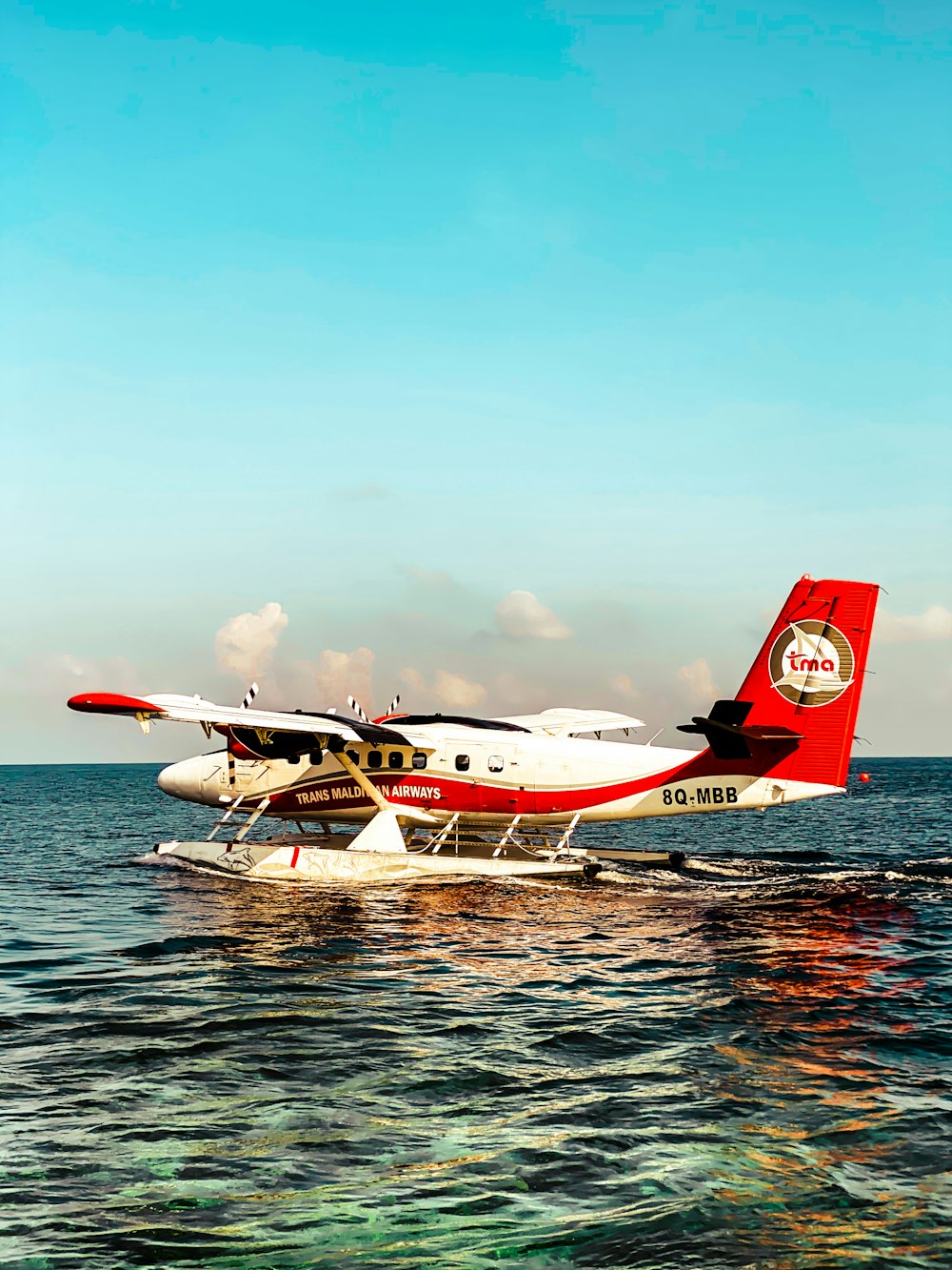 a small airplane on the water