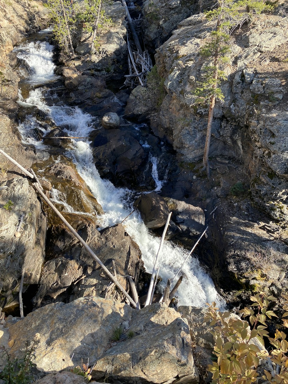 a small waterfall in a rocky area