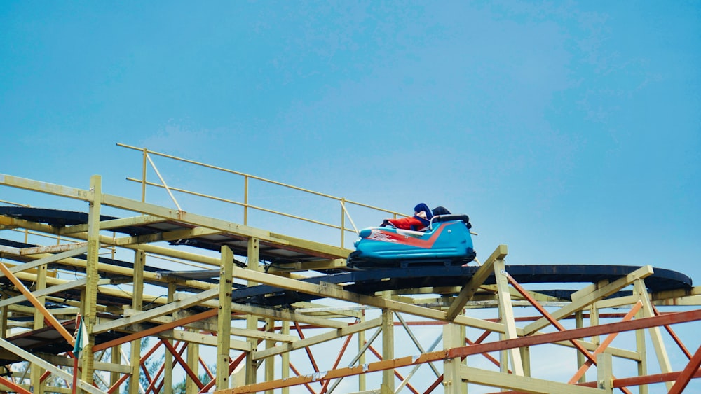 a roller coaster with a blue sky