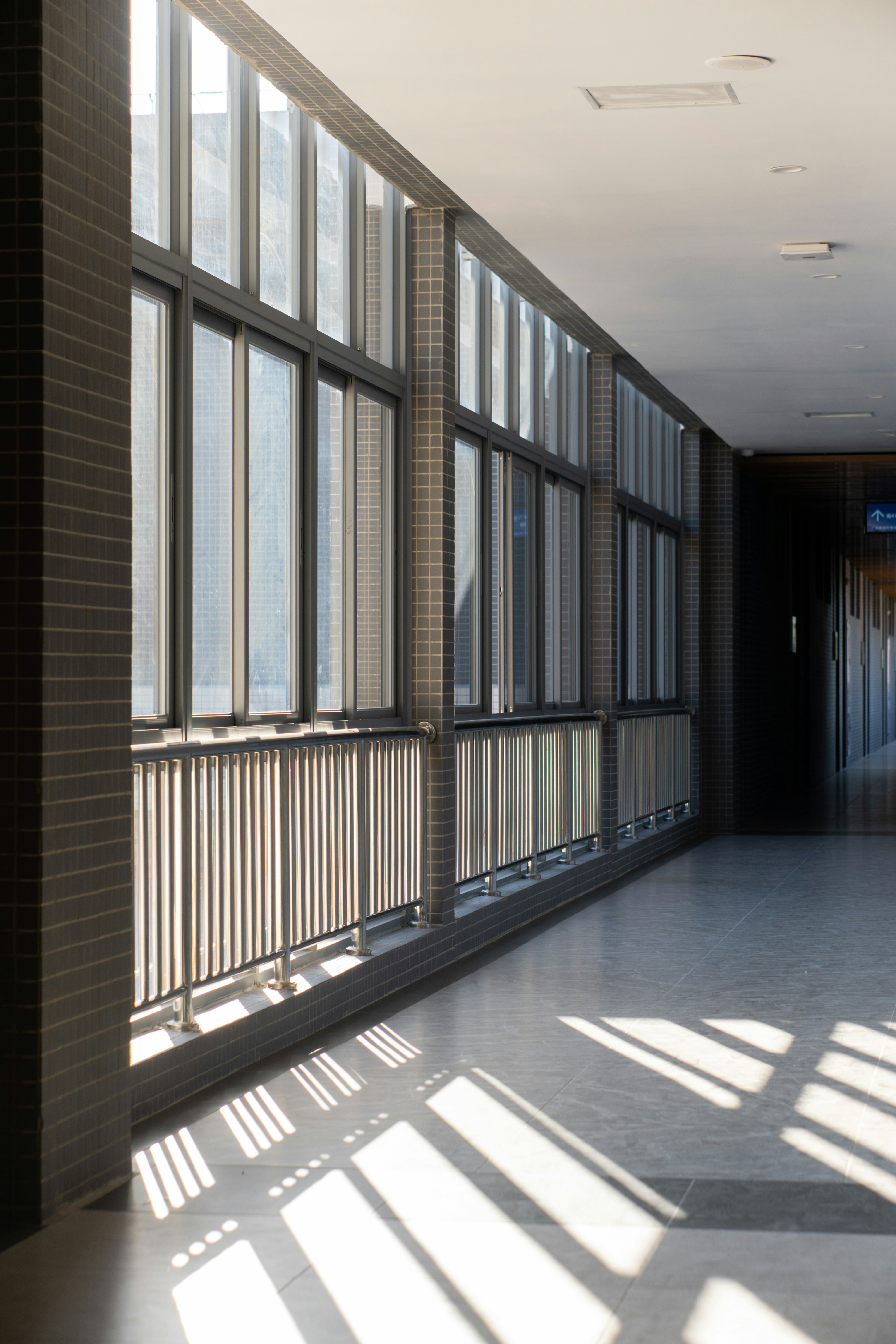 a hallway with many windows