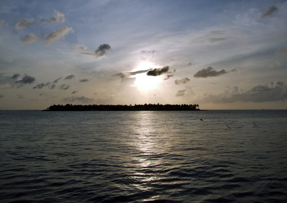 a body of water with a land in the distance