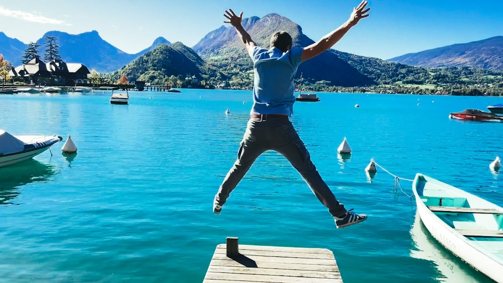 a person jumping into the water