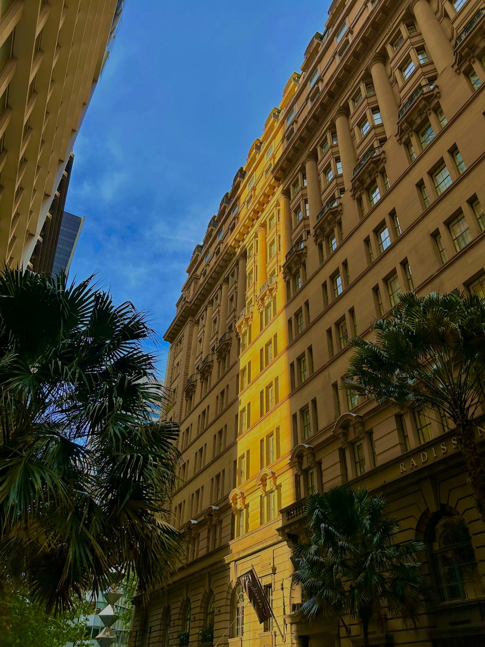 a building with trees in front of it