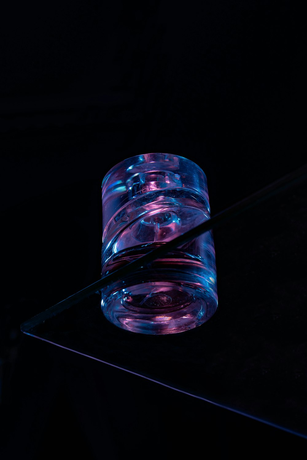a light bulb with a blue light