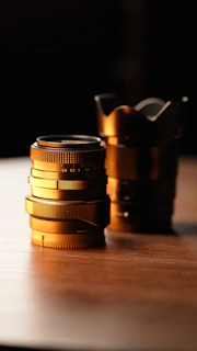 Artistic shot of lenses reflecting soft natural light, emphasizing clarity and quality.