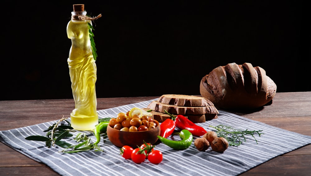 a table with food and a bottle