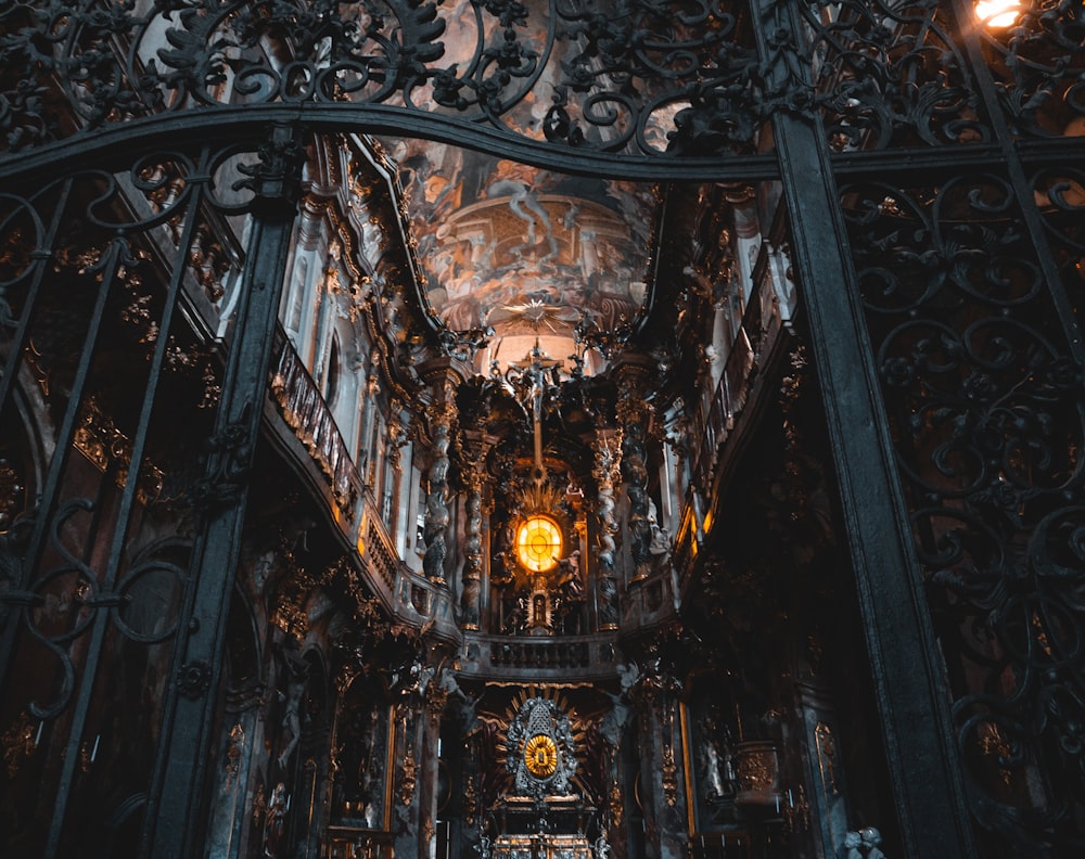 a large ornate ceiling with a clock