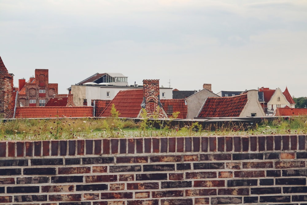 a brick wall with a brick fence and a brick wall with a brick wall and a brick wall