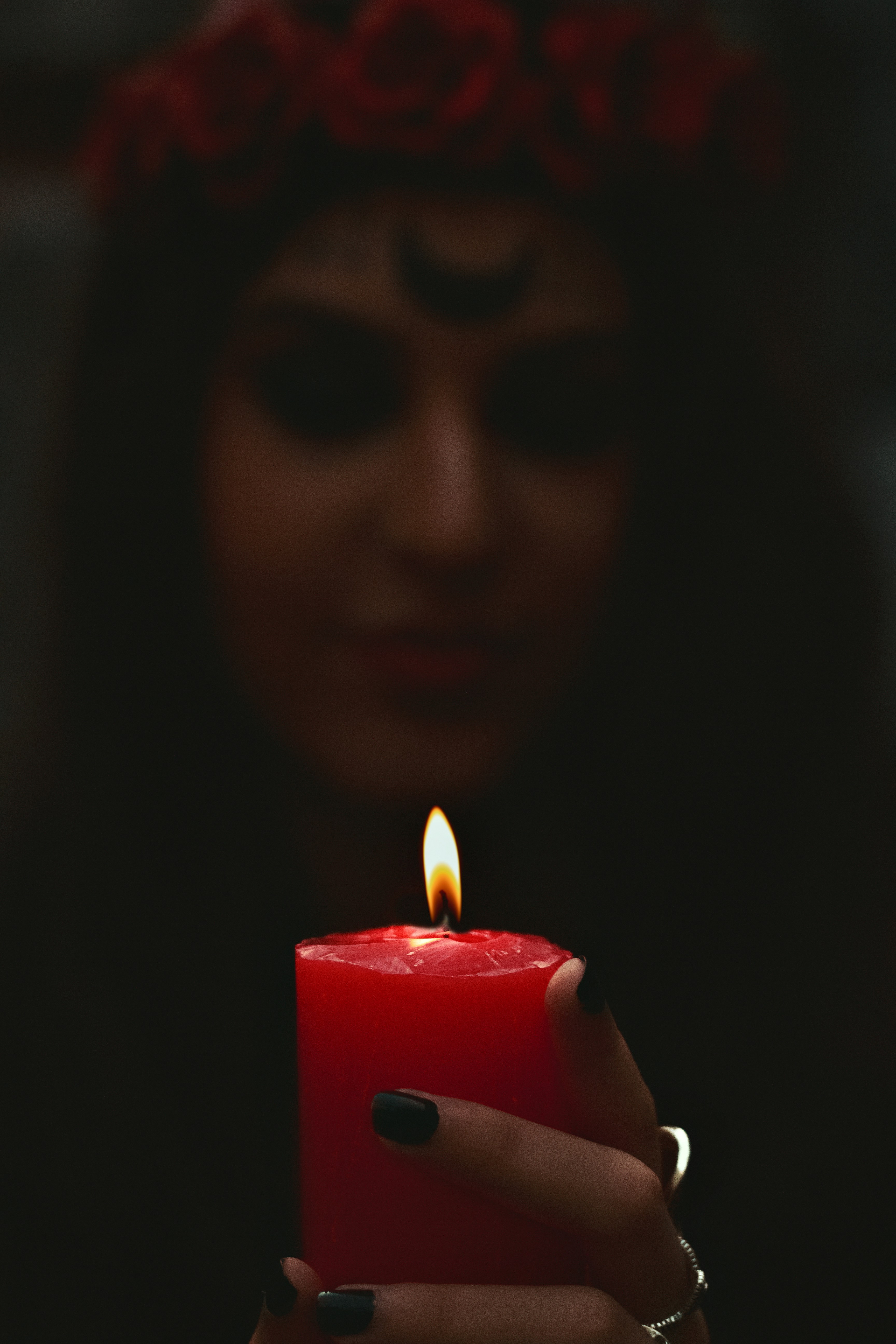 a person holding a candle
