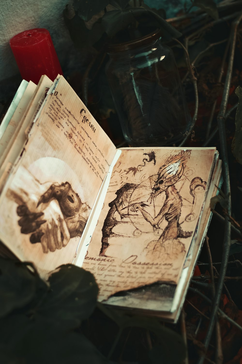 a book and a glass on a table