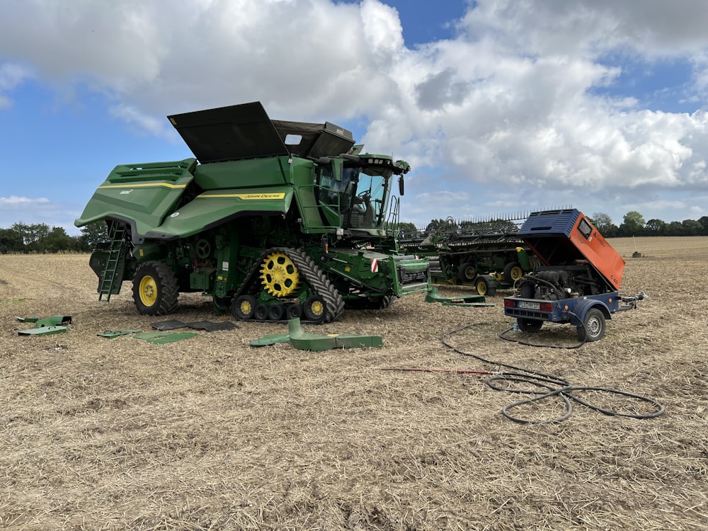 a few tractors in a field