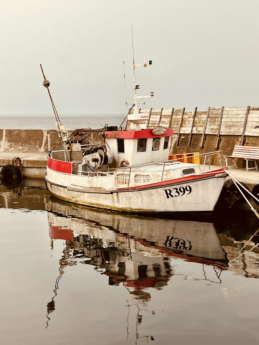 a boat docked at a pier