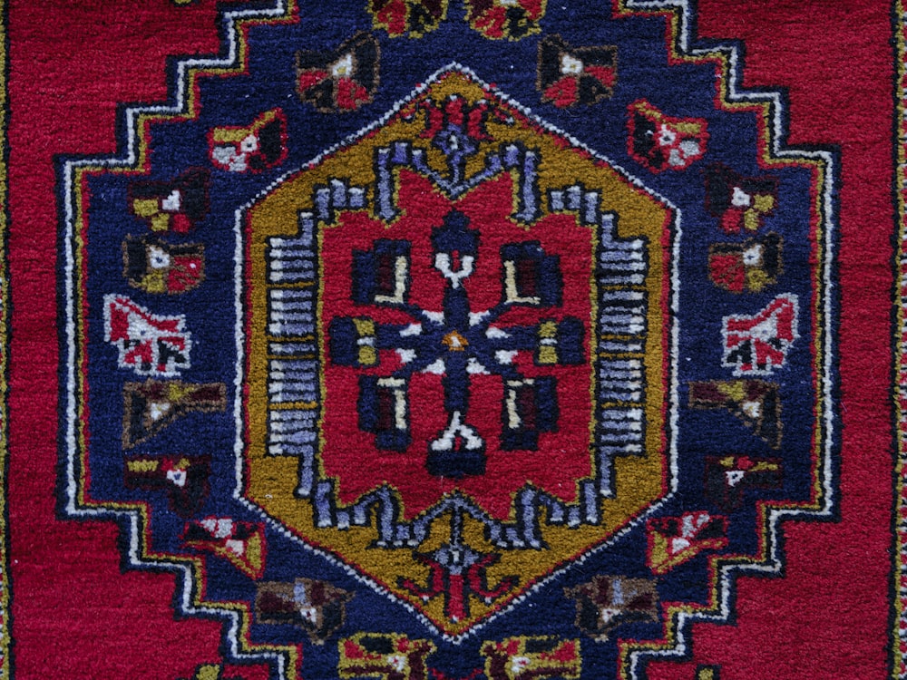 a colorful rug with a design