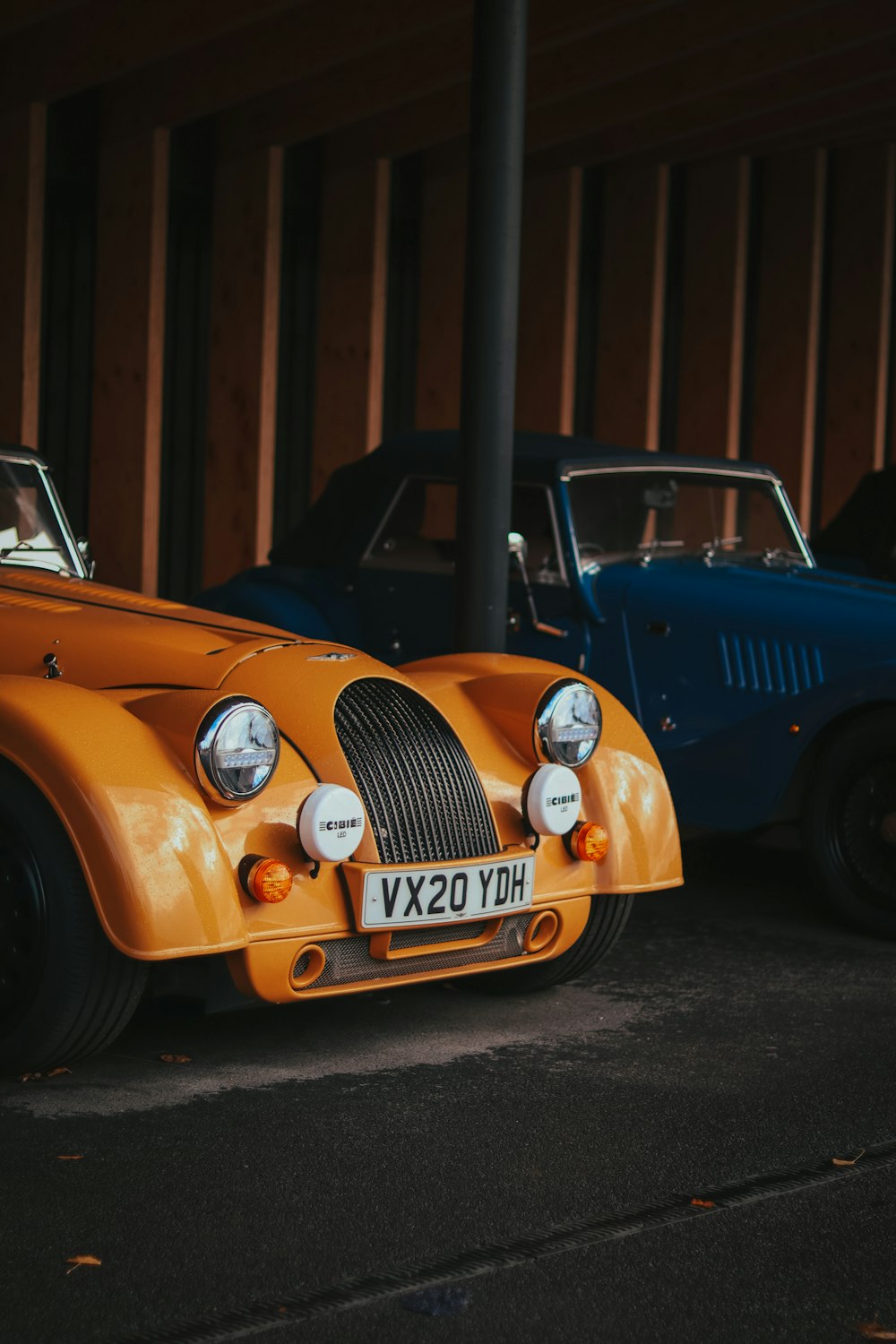 a couple of cars parked next to each other