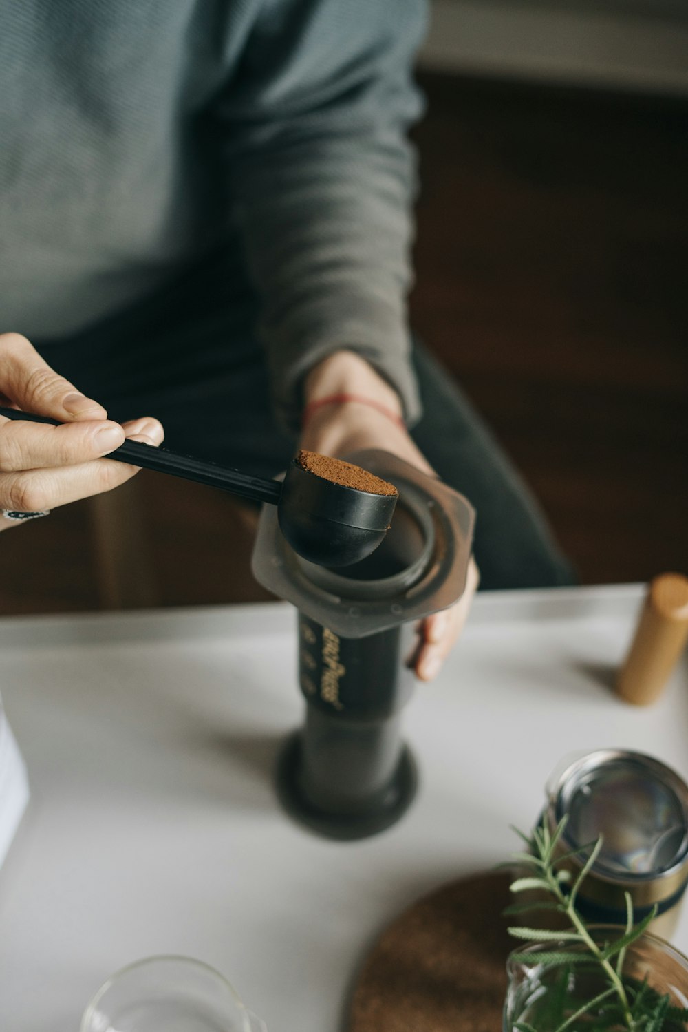 a person holding a black object