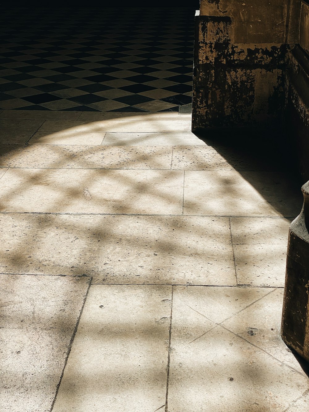 a stone walkway with a door