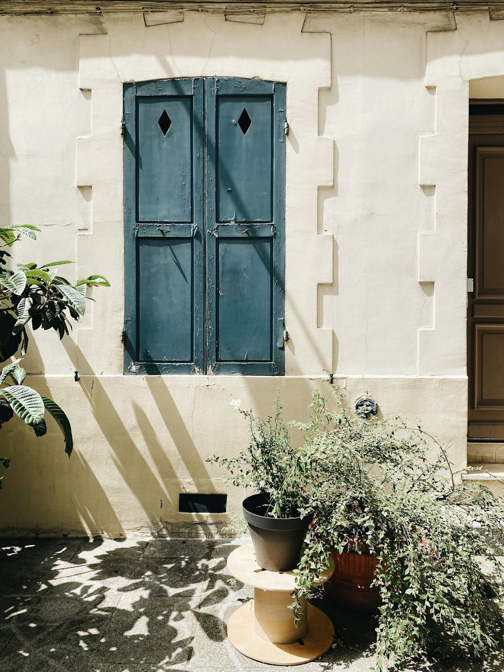 a blue door on a white building