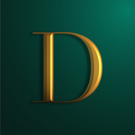 A bold, gold metallic letter 'D' with a 3D effect is set against a dark green background. The letter casts a shadow, giving it a dimensional look.