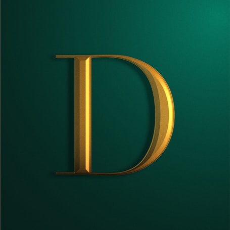 A bold, gold metallic letter 'D' with a 3D effect is set against a dark green background. The letter casts a shadow, giving it a dimensional look.