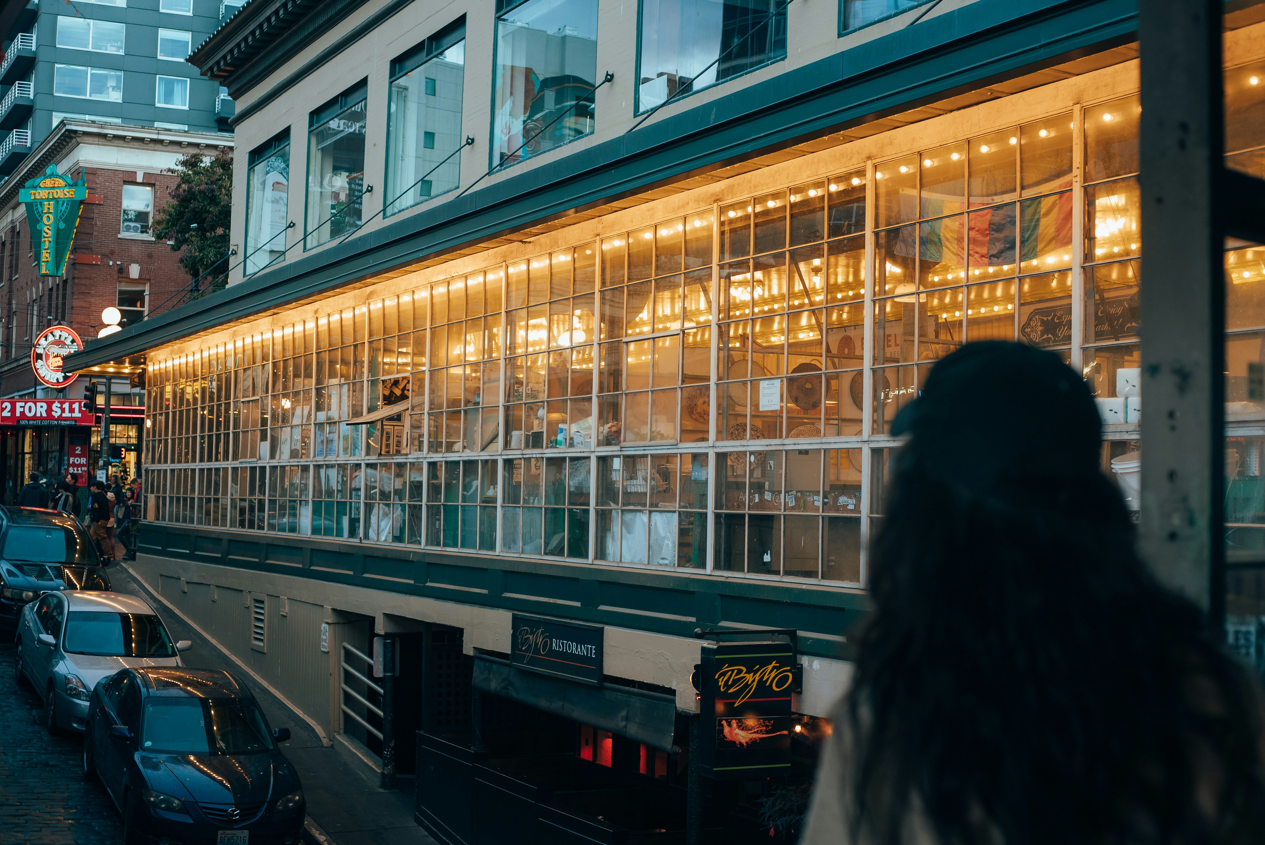 a person walking on a sidewalk