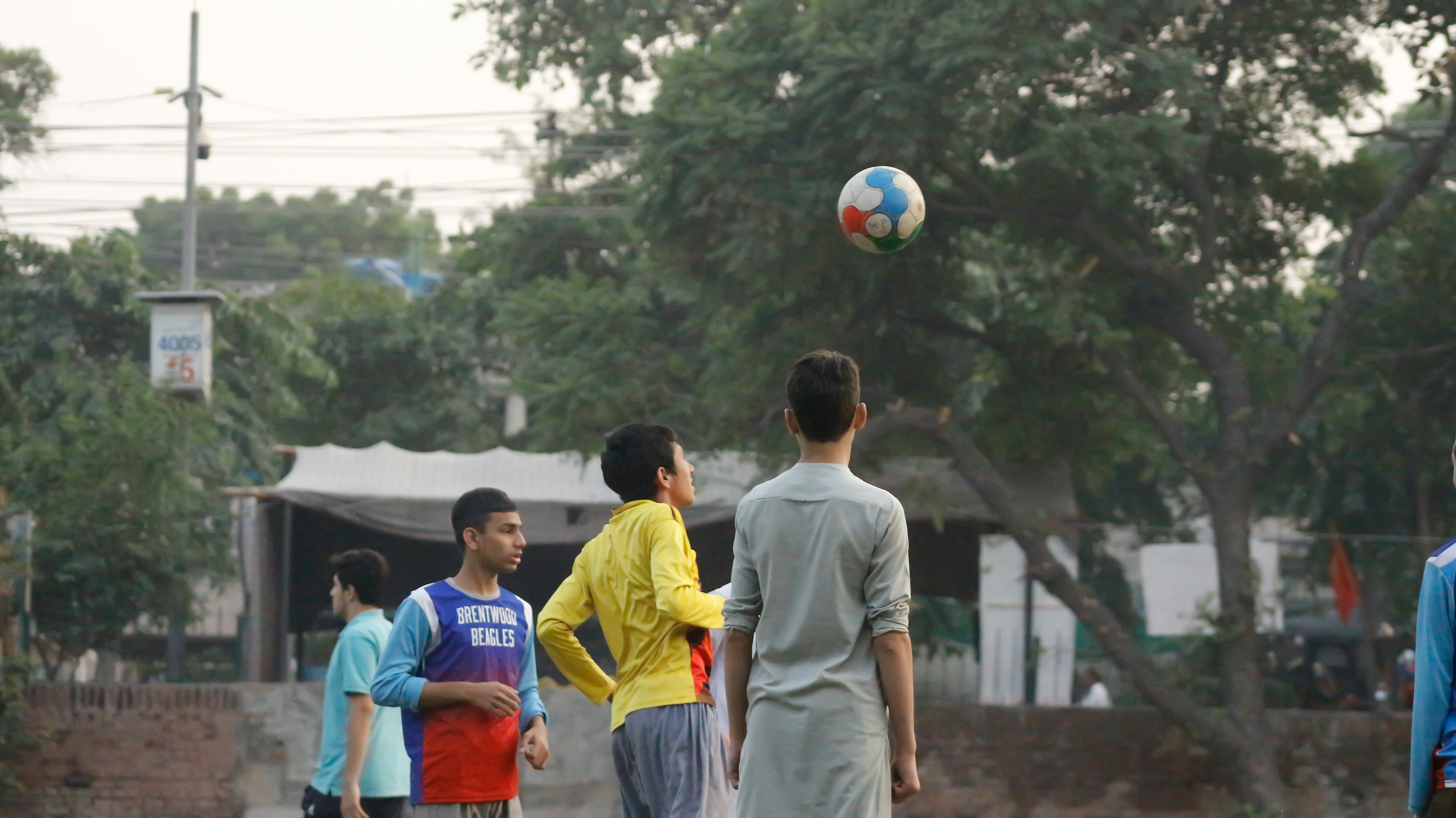 a group of boys playing football