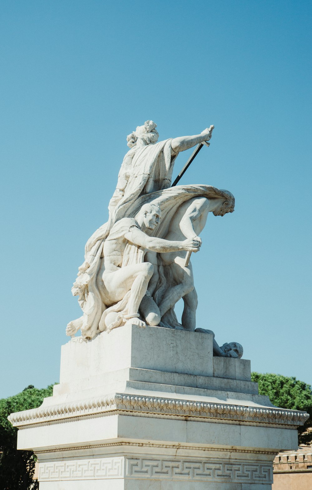 a statue of a person riding a horse