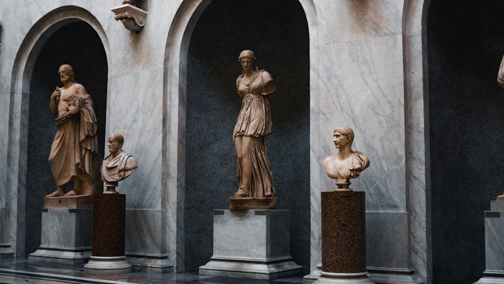 a group of statues in a room