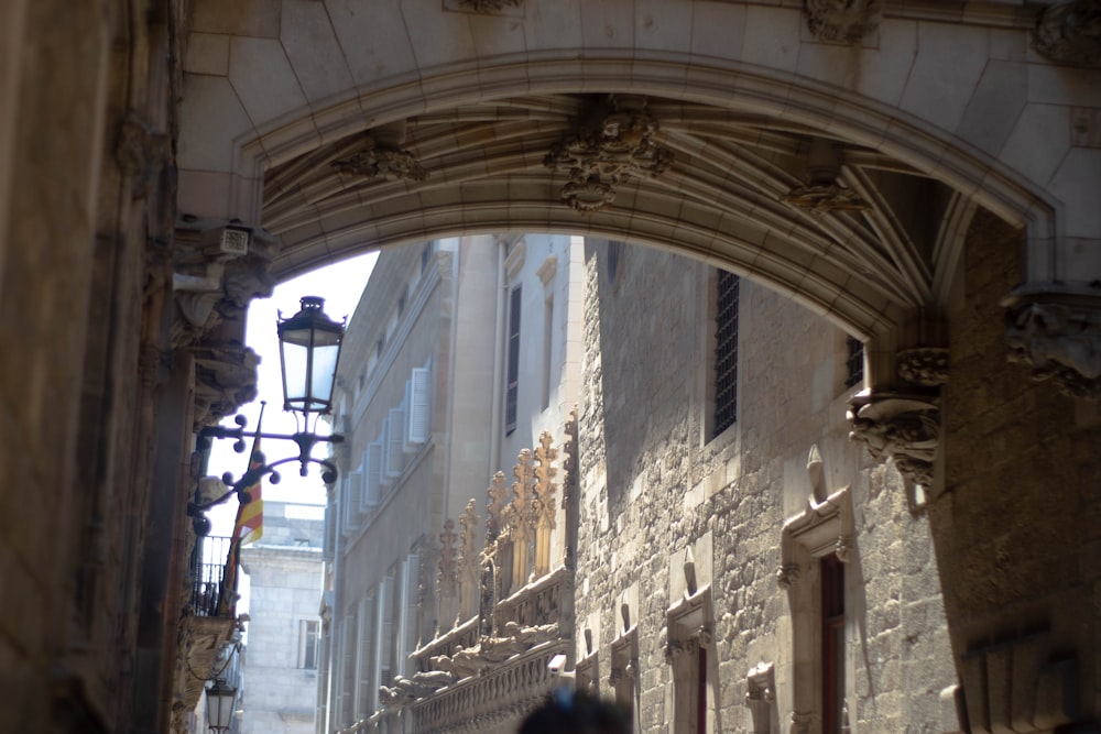 a stone building with a light on the side