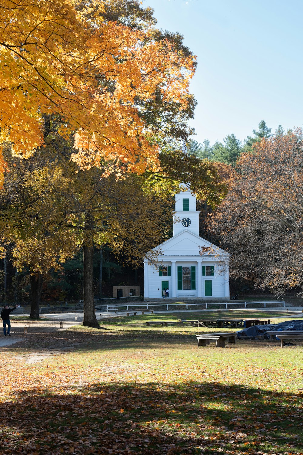 a white building with a clock tower