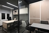 a room with a table and chairs