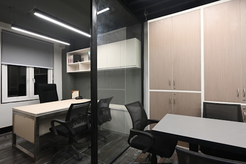 a room with a table and chairs