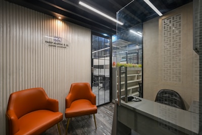 a room with chairs and a table