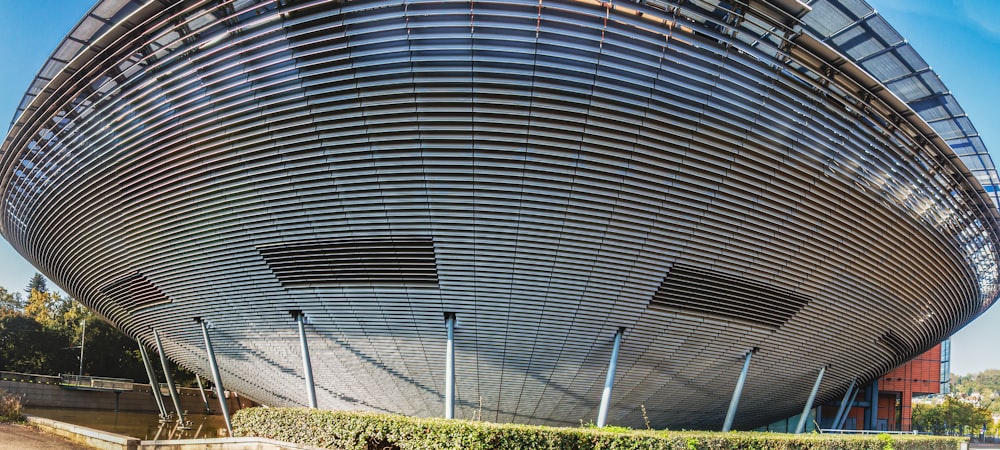 a large building with a curved roof