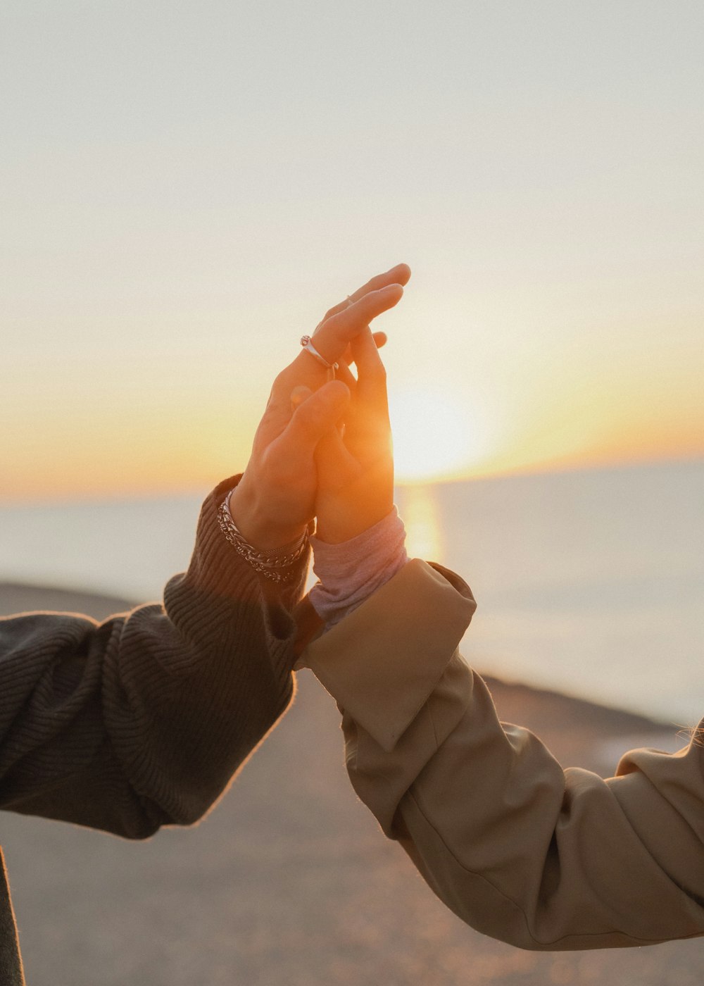 a couple of hands holding up their fingers