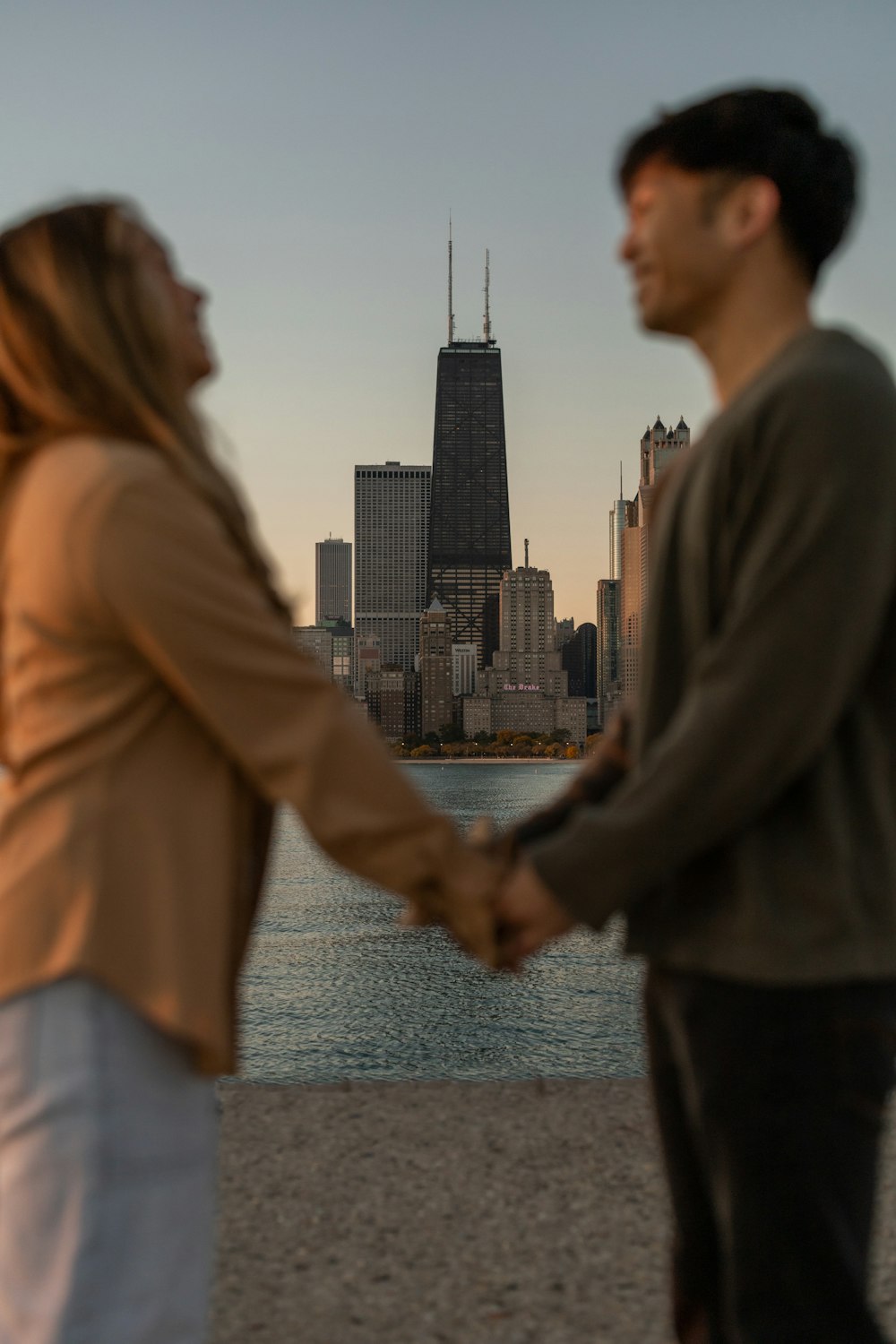 a man and woman shaking hands