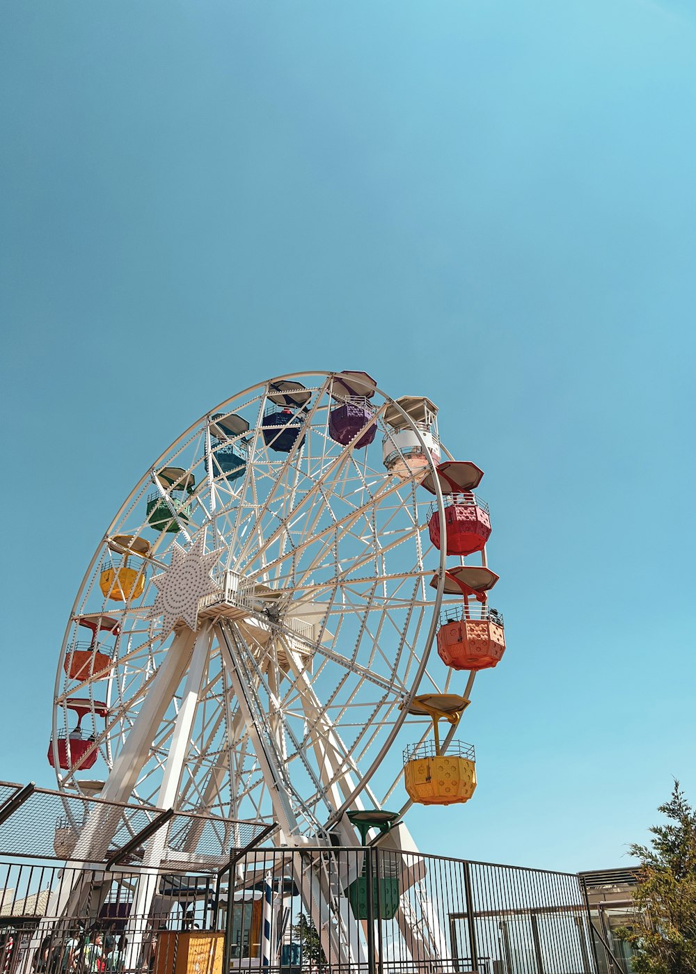 a ferris wheel with a blue sky