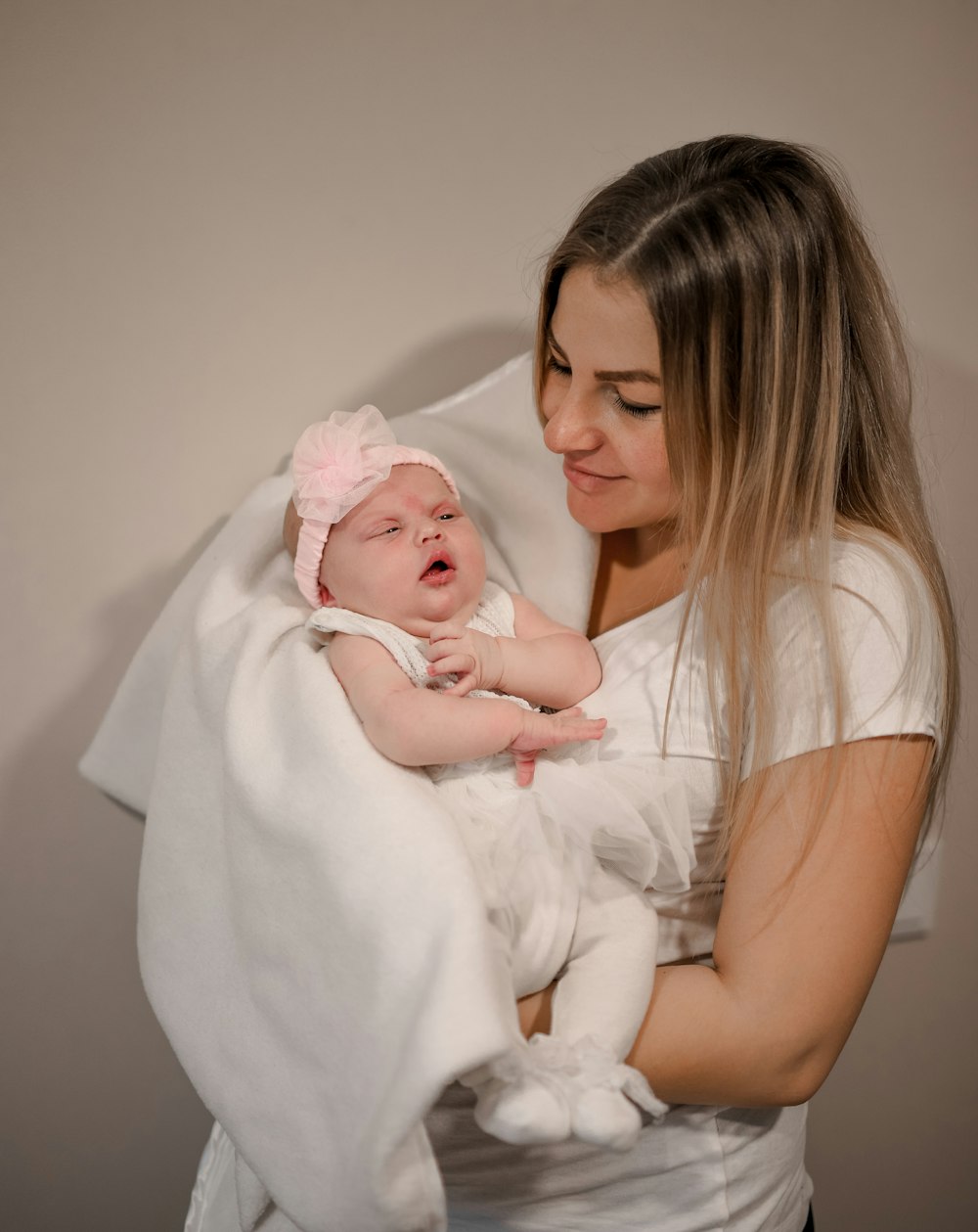 a person holding a baby