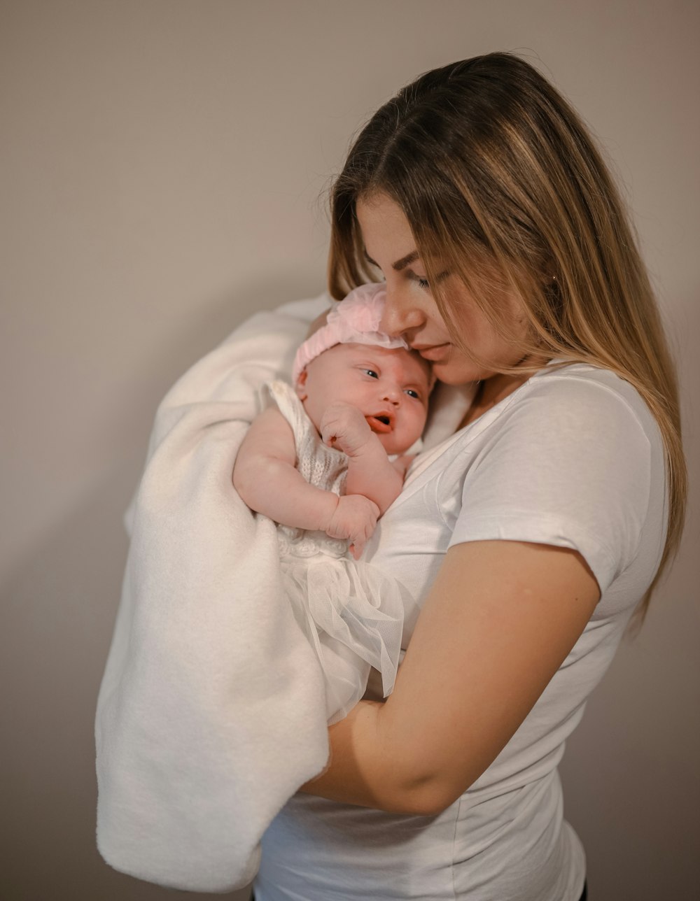 a person holding a baby