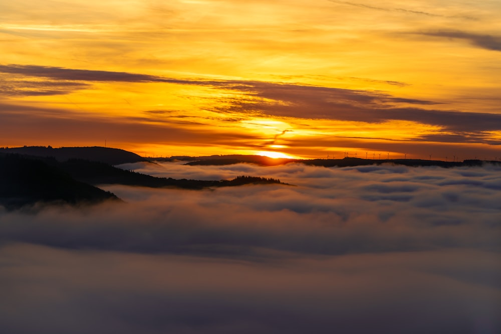 a sunset over a body of water