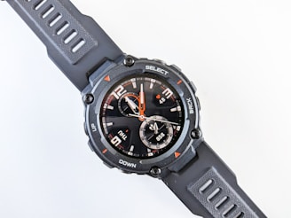 Sporty wristwatch with a durable black strap and bold, clear numerals on the dial.