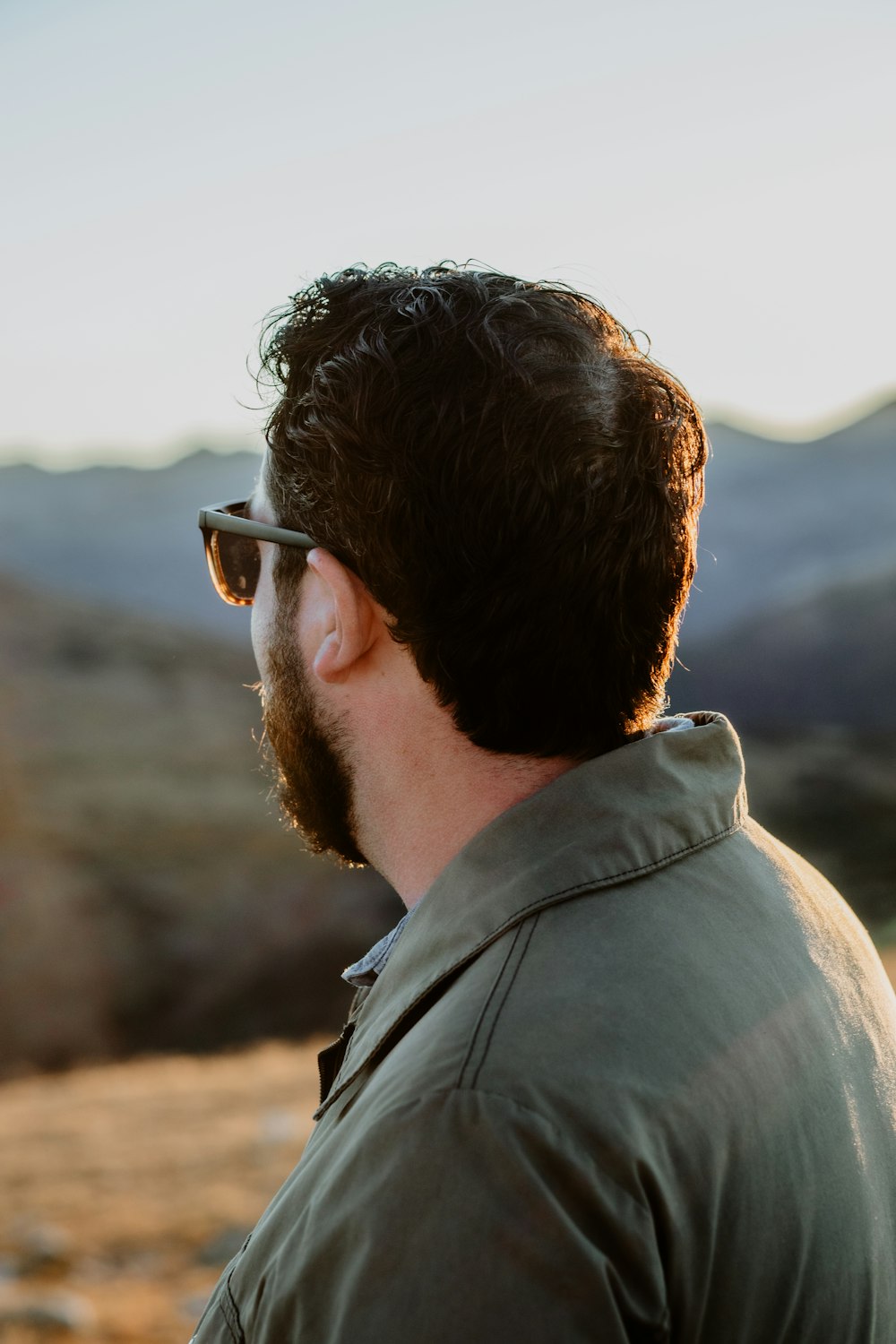 a man with a beard and sunglasses