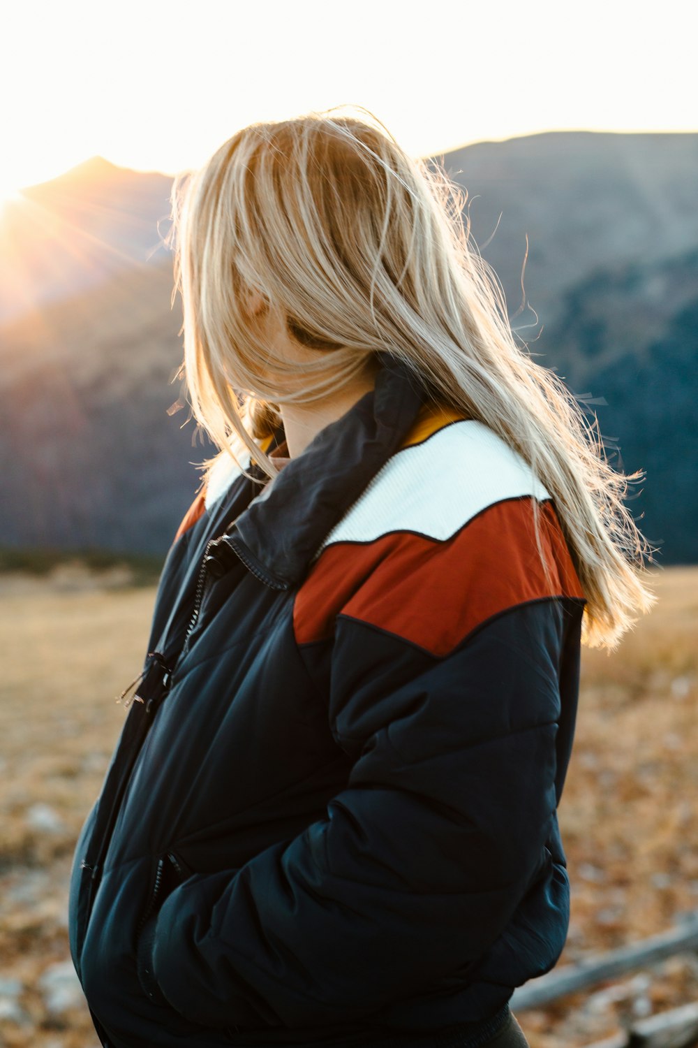 a woman with long blonde hair