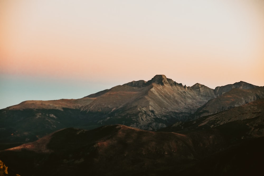 a mountain range with a sunset