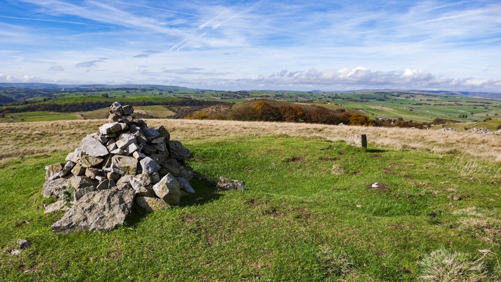 a pile of rocks in a field