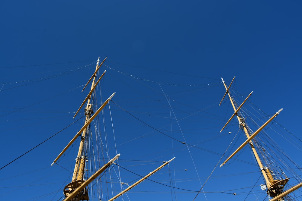 a group of masts and wires