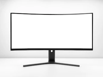 a white monitor with a black stand
