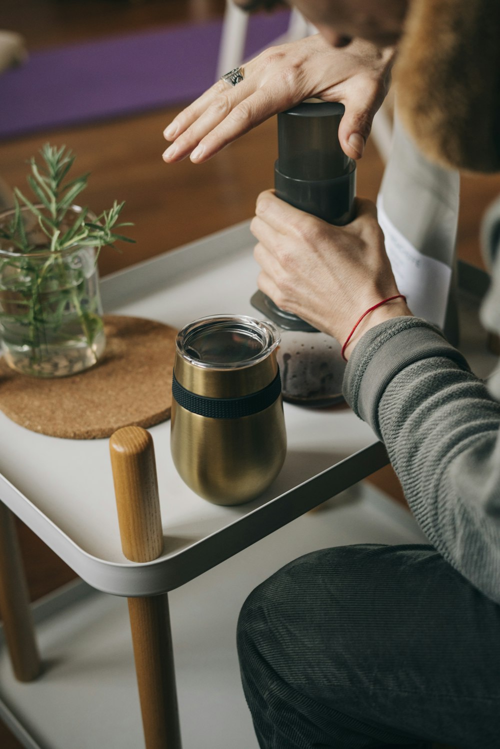 a person holding a can