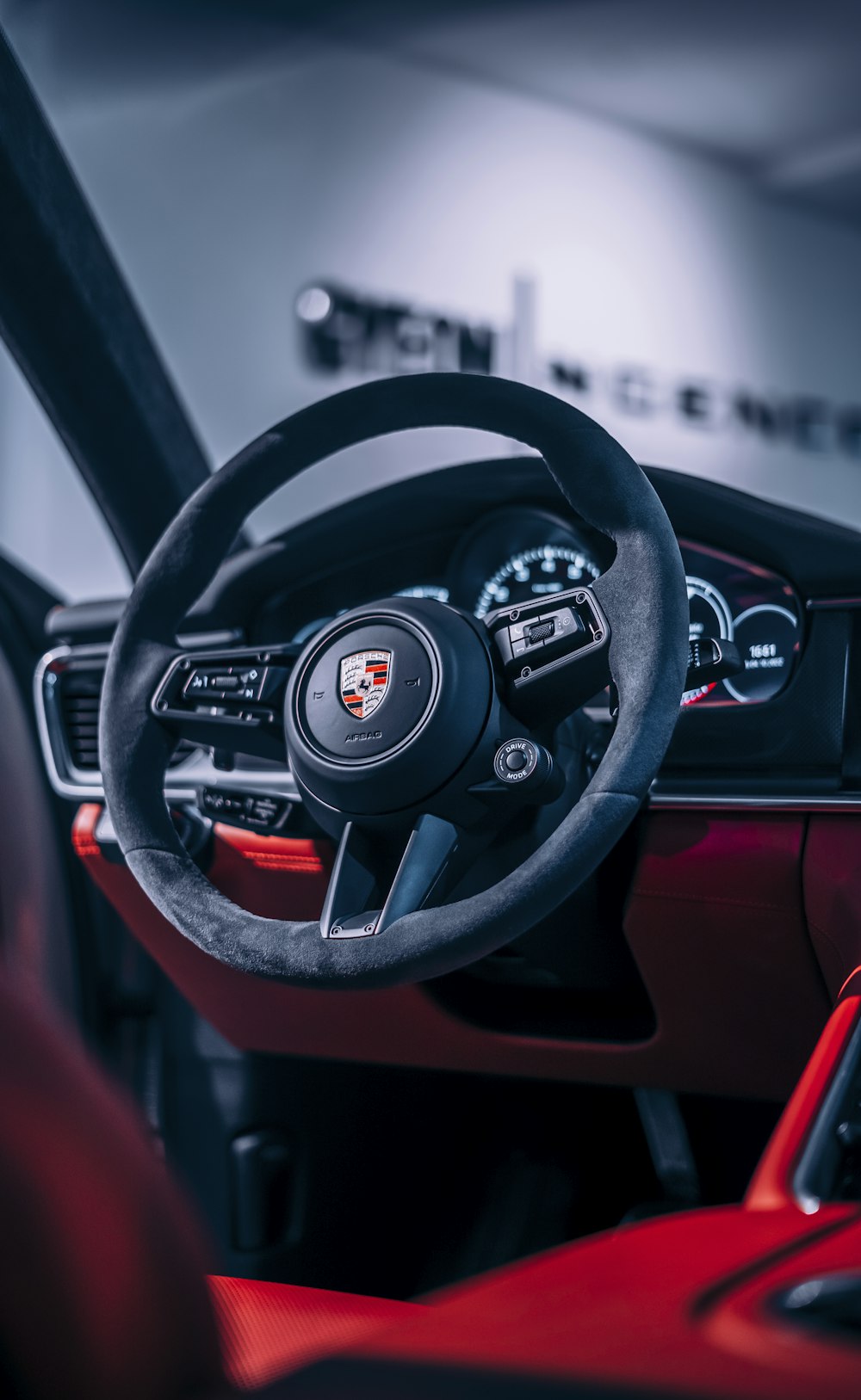 a car steering wheel and dashboard