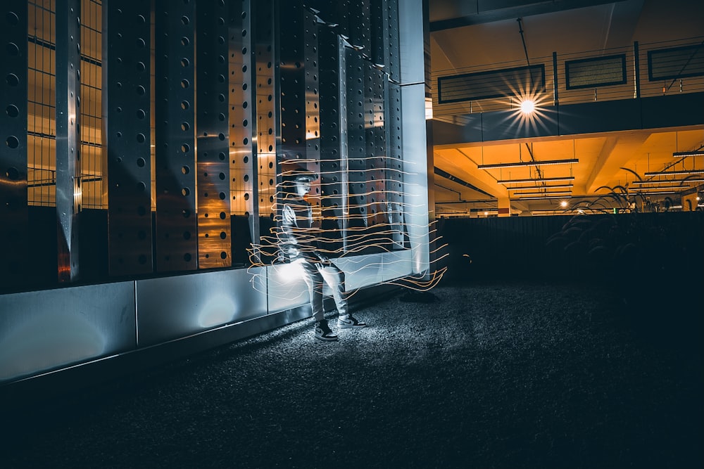 a person in a room with a large window