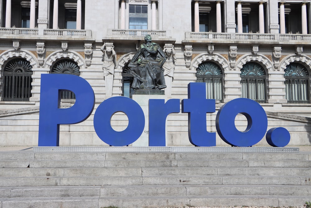 a building with blue and white signs